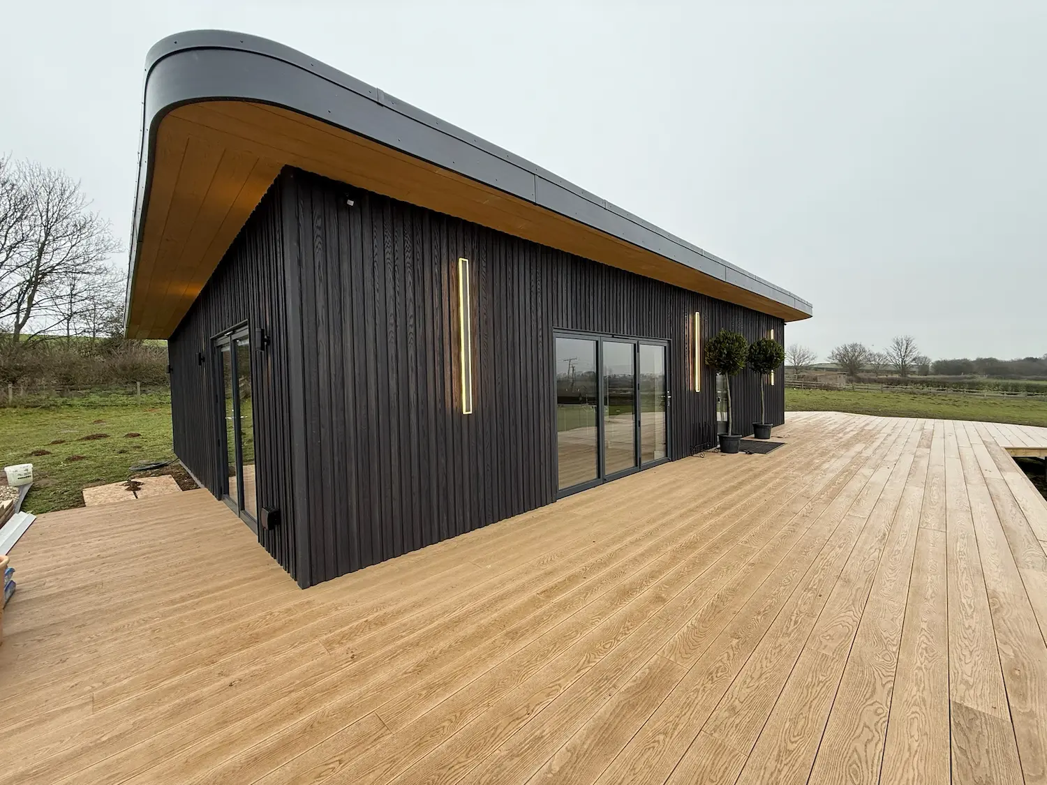 luxury sips annexe exterior wraparound deck farmland